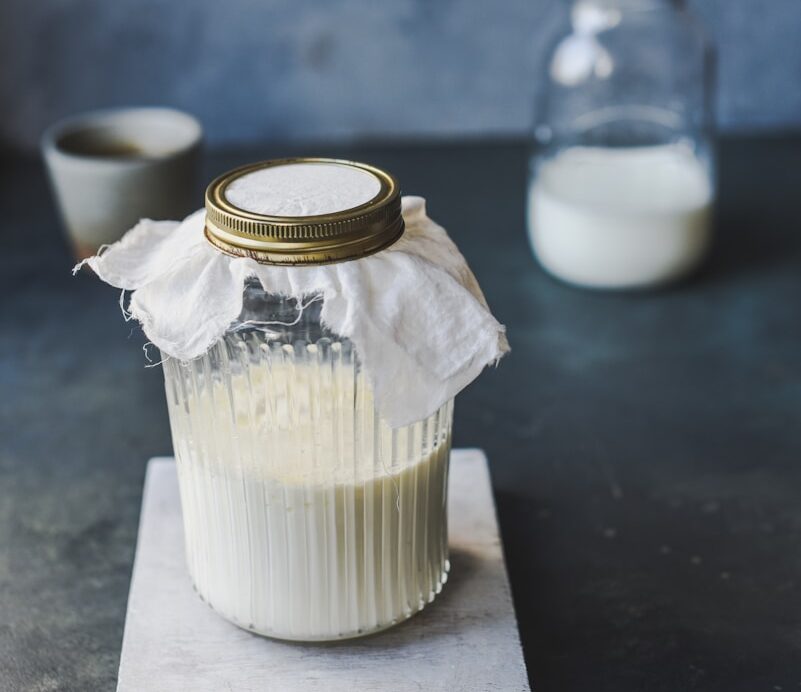 clear glass jar with white liquid